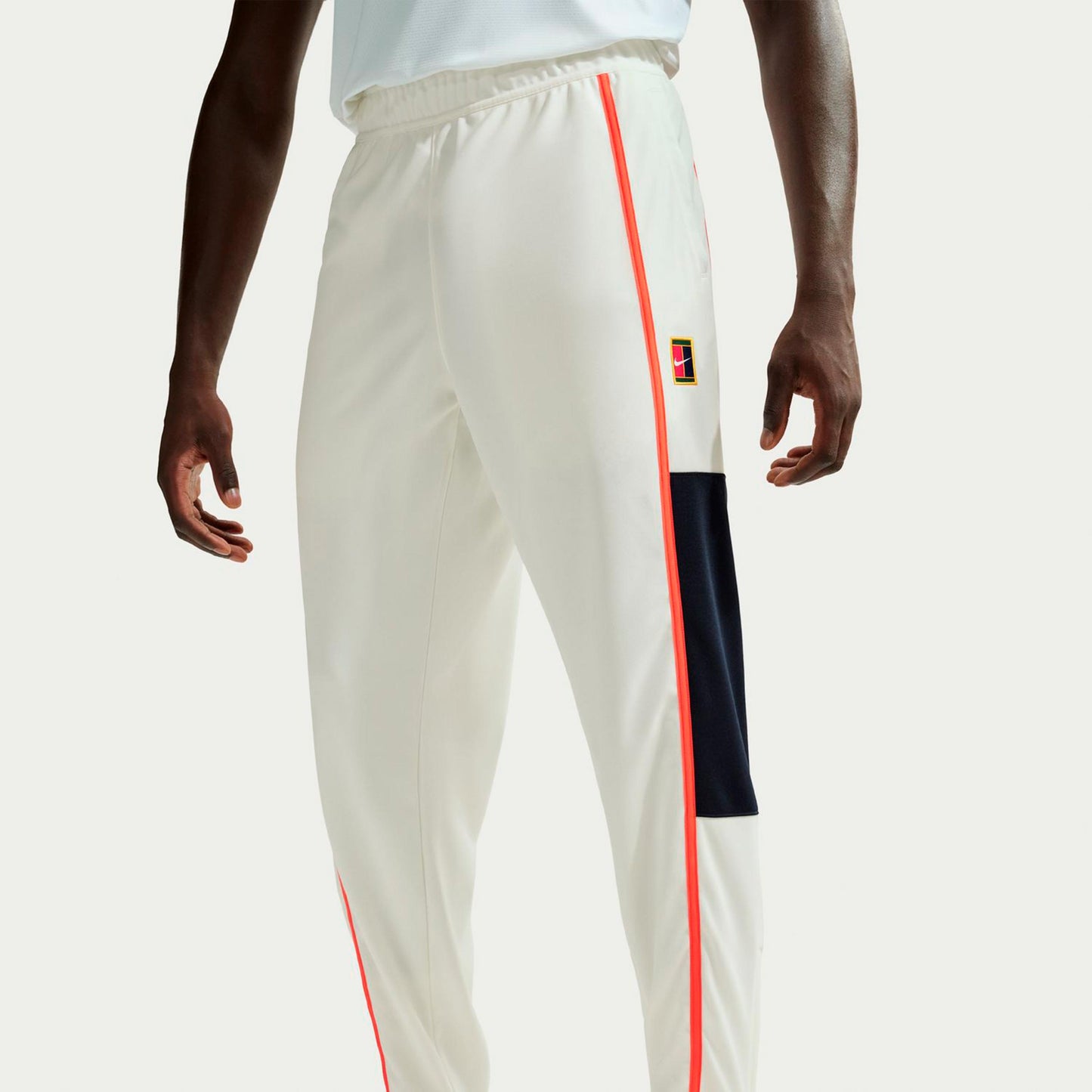 Nike Court Heritage Tréninkové kalhoty Muži-krémová, oranžová