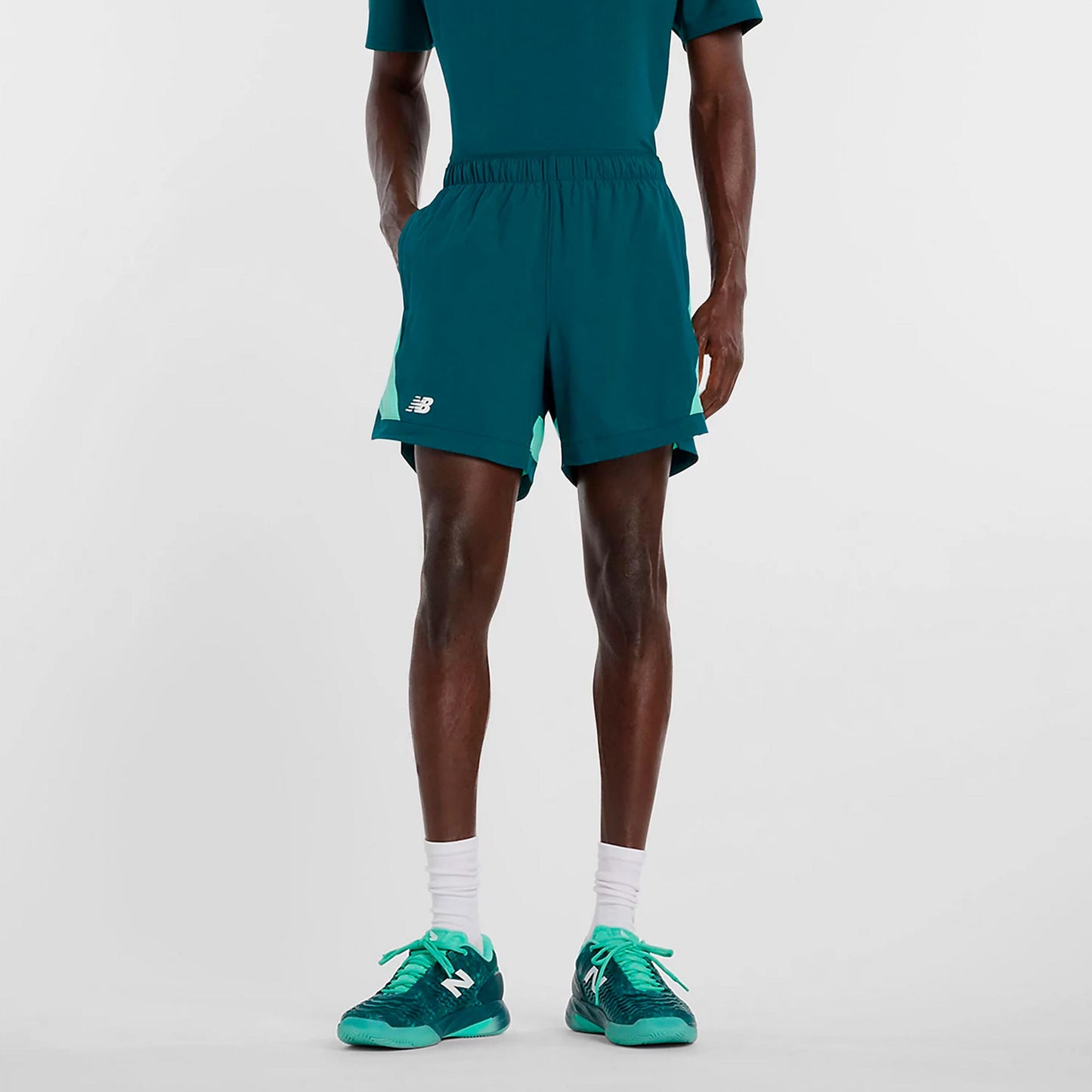 New Balance Tournament Novelty Šortky Muži-petrolejová, bílá
